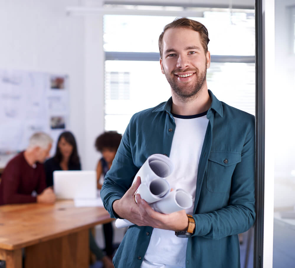 man with construction plans