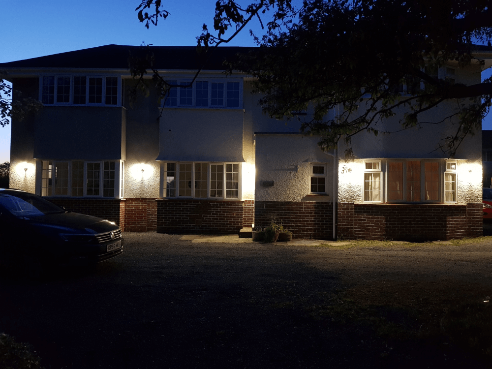 2 storey extension lit up at night when completed